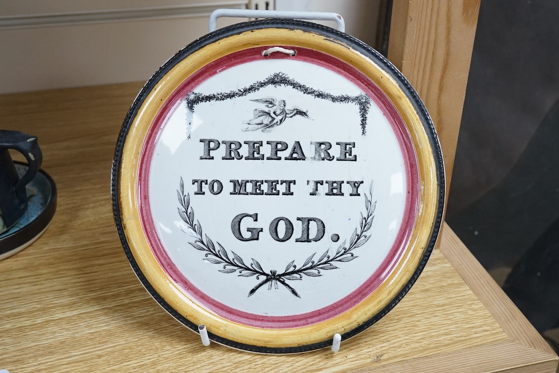 A 19th century pottery plaque ‘Prepare to Meet Thy God’, 19cm in diameter